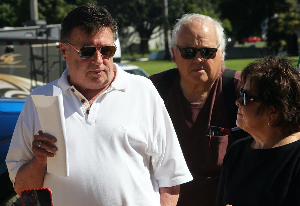 Dana and his wife Brenda Dunbar address the crowd after the groundbreaking ceremony for a new White River Humane Society facility on Wednesday, Aug. 30, 2023