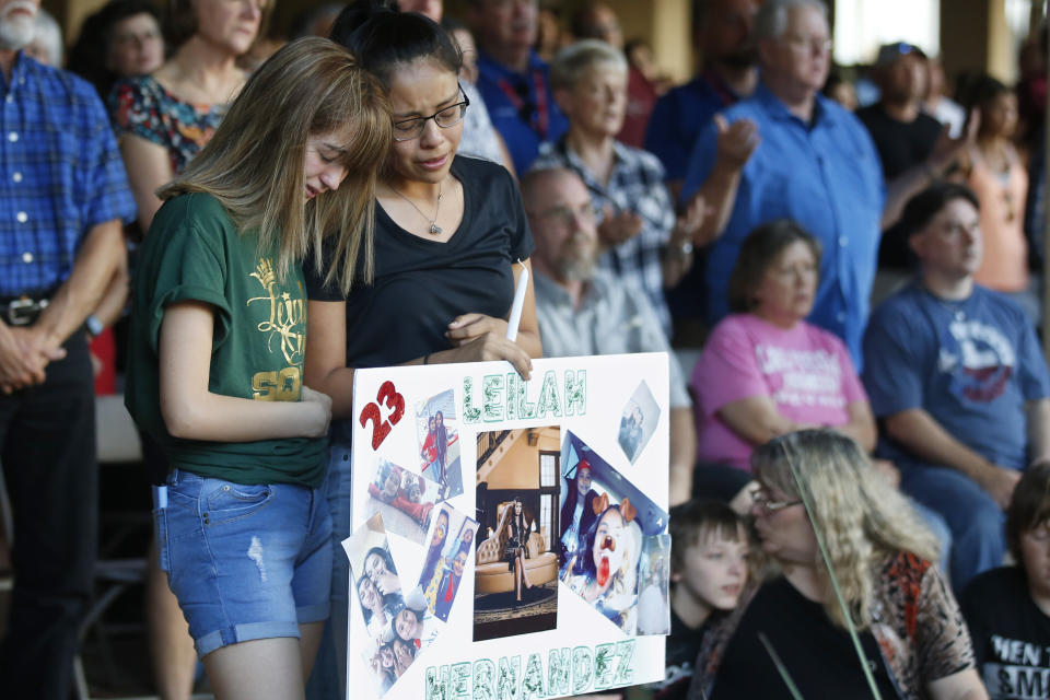 High School students Celeste Lujan, left, and Yasmin Natera, right, mourn their friend Leila Hernandez, one of the victims of the Saturday shooting in Odessa, at a memorial service on Sunday. (Photo: ASSOCIATED PRESS)