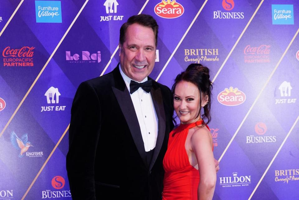 British Curry Awards 2022  - London: David Seaman and Frankie Poultney arrive at the British Curry Awards 2022 at Evolution London. Picture date: Monday November 28, 2022. PA Photo. (PA)