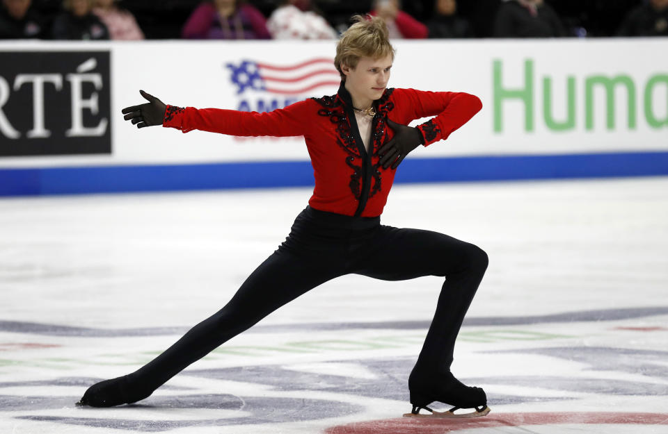 FILE - Ilia Malinin, of the United States, competes in the men's short program during the Grand Prix Skate America Series in Allen, Texas, Friday, Oct. 20, 2023. Ilia Malinin and Isabeau Levito will try to defend their U.S. figure skating titles this weekend in Columbus, Ohio. (AP Photo/Roger Steinman, File)