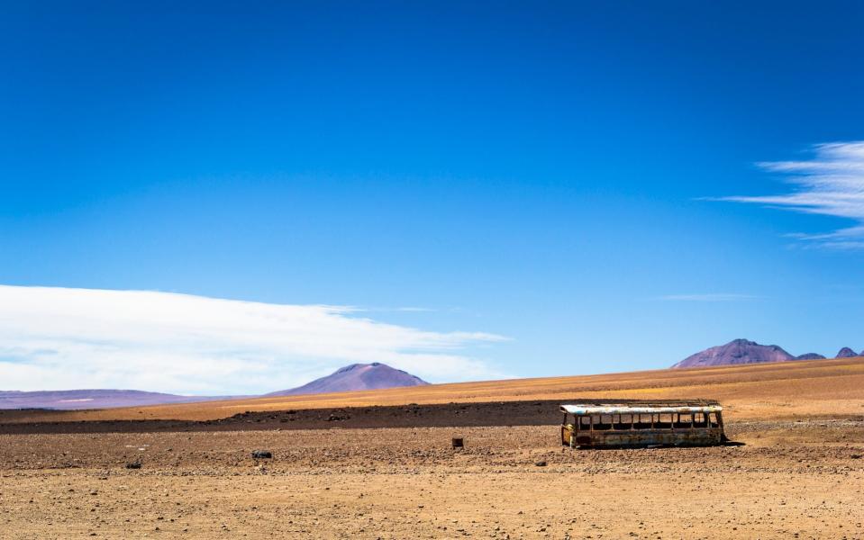 An abandoned bus at the border of Bolivia and Chile - Getty