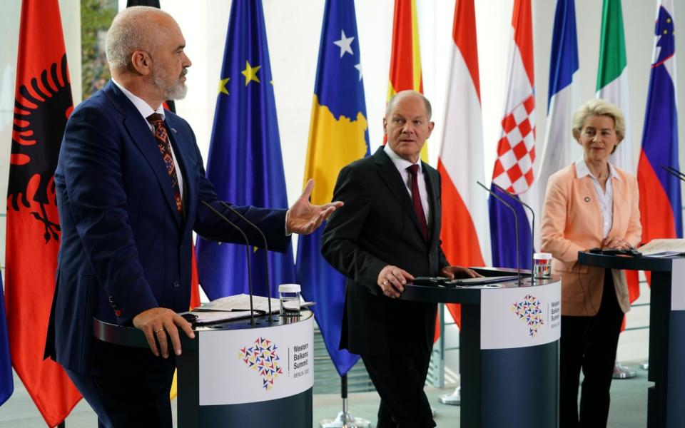 Albania's Prime Minister Edi Rama (L) speaks next to German Chancellor Olaf Scholz (C) European Commission President Ursula von der Leyen (R) during the press conference of the 'Western Balkans Conference' at the Chancellery in Berlin - CLEMENS BILAN/EPA-EFE/Shutterstock 