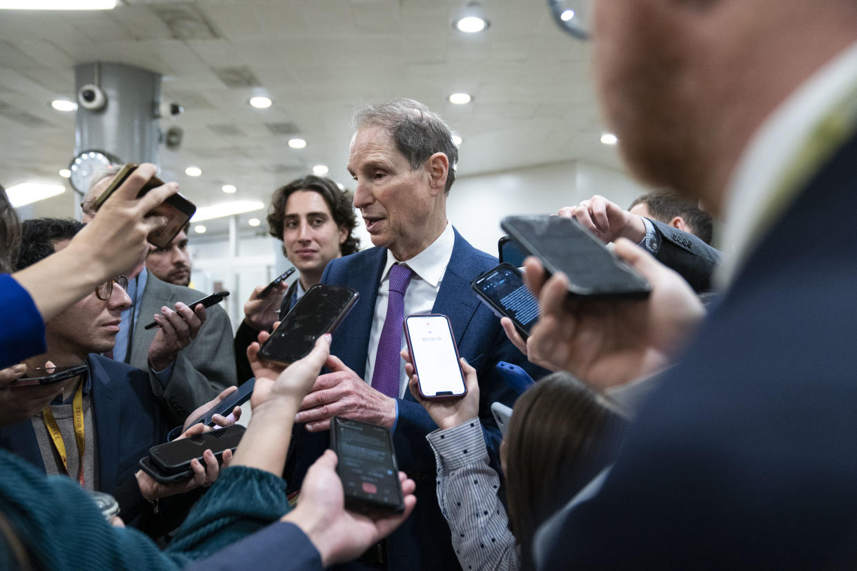 WASHINGTON, UNITED STATES - DECEMBER 7: Senator Ron Wyden, D-Ore., speaks to reporters in the Senate Subway of the U.S. Capitol in Washington, D.C., on Wednesday, December 7, 2022. (Photo by Sarah Silbiger for The Washington Post via Getty Images)