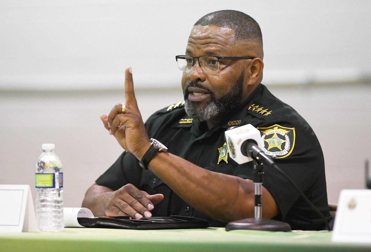 Former Clay County Sheriff Darryl Daniels addresses questions from residents during a town hall gathering in 2020. Following his arrest amid a sex scandal, he is now scheduled for trial this week.