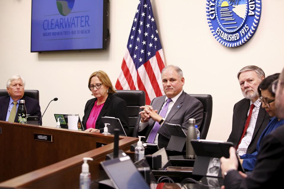 Members of the Clearwater City Council, from left, Councilmember David Allbritton, Councilmember Kathleen Beckman, Mayor Frank Hibbard, Councilmember Mark Bunker, and Councilmember Lina Teixeira, listen as Clearwater's city attorney David Margolis explains the process for entering into contract negotiations with Interim Clearwater City Manager Jennifer Poirrier during a meeting of the Clearwater City Council on Thursday, March 2, 2023, in downtown Clearwater, Fla. Hibbard turned in his resignation during a tense budget meeting, Monday, March 20 and said he made the quick decision due to concerns over the direction his colleagues were taking with city funds. (Douglas R. Clifford/Tampa Bay Times via AP)