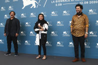 Director Majid Majidi, from left, actors Shamila Shirzad and Javad Ezati pose for photographers at the photo call for the film 'Khorshid (Sun Children' during the 77th edition of the Venice Film Festival in Venice, Italy, Sunday, Sept. 6, 2020. (Photo by Joel C Ryan/Invision/AP)