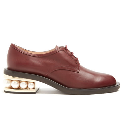 <p><strong>Nicholas Kirkwood</strong> shoes, $995, matchesfashion.com</p><p><a rel="nofollow noopener" href="https://www.matchesfashion.com/us/products/Nicholas-Kirkwood-Casati-pearl-heeled-leather-derby-shoes-1161869" target="_blank" data-ylk="slk:BUY NOW;elm:context_link;itc:0;sec:content-canvas" class="link ">BUY NOW</a></p>