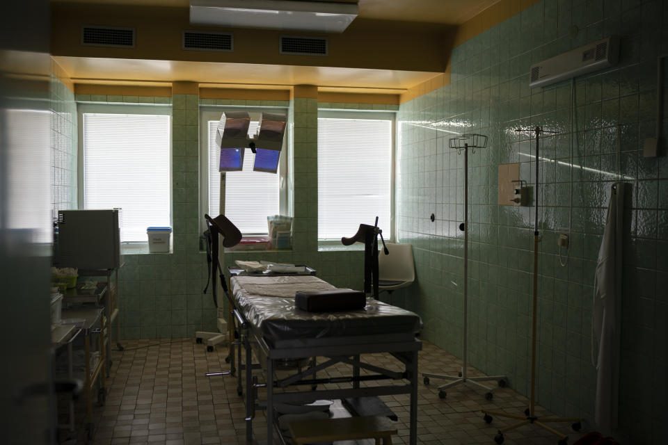 In this Nov. 15, 2018, photo, a delivery room sits empty in the Trebisov hospital in Trebisov, Slovakia. An investigation by The Associated Press has found that women and their newborns in Slovakia are routinely, unjustifiably and illegally detained in hospitals across the European Union country. (AP Photo/Felipe Dana)