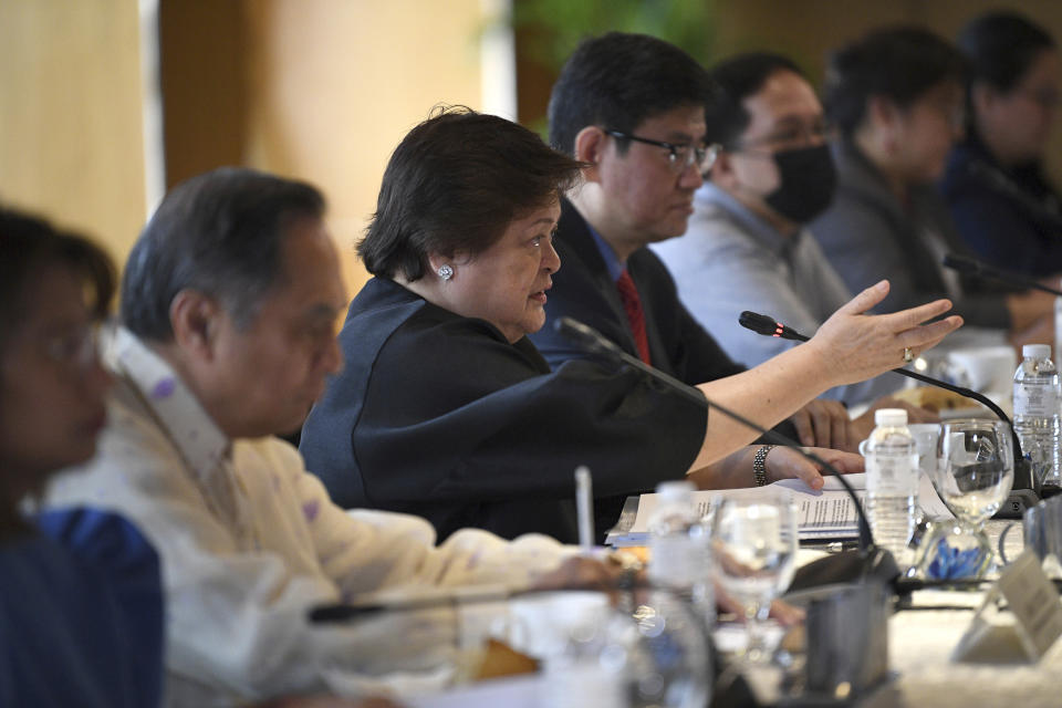 Theresa Lazaro, third from left, Philippines' Undersecretary for Bilateral Relations and Asian Affairs of the Department of Foreign Affairs, gestures as she delivers her opening statement during the Philippines-China Foreign Ministry consultation meeting at a hotel in Manila on Thursday, March 23, 2023.(Ted Aljibe/Pool Photo via AP)