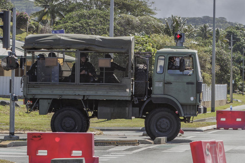 FILE - French gendarmes patrol the streets in Noumea, New Caledonia, on May, 16, 2024. Global nickel prices have soared since deadly violence erupted in the French Pacific territory of New Caledonia. (AP Photo/Cedric Jacquot, File)