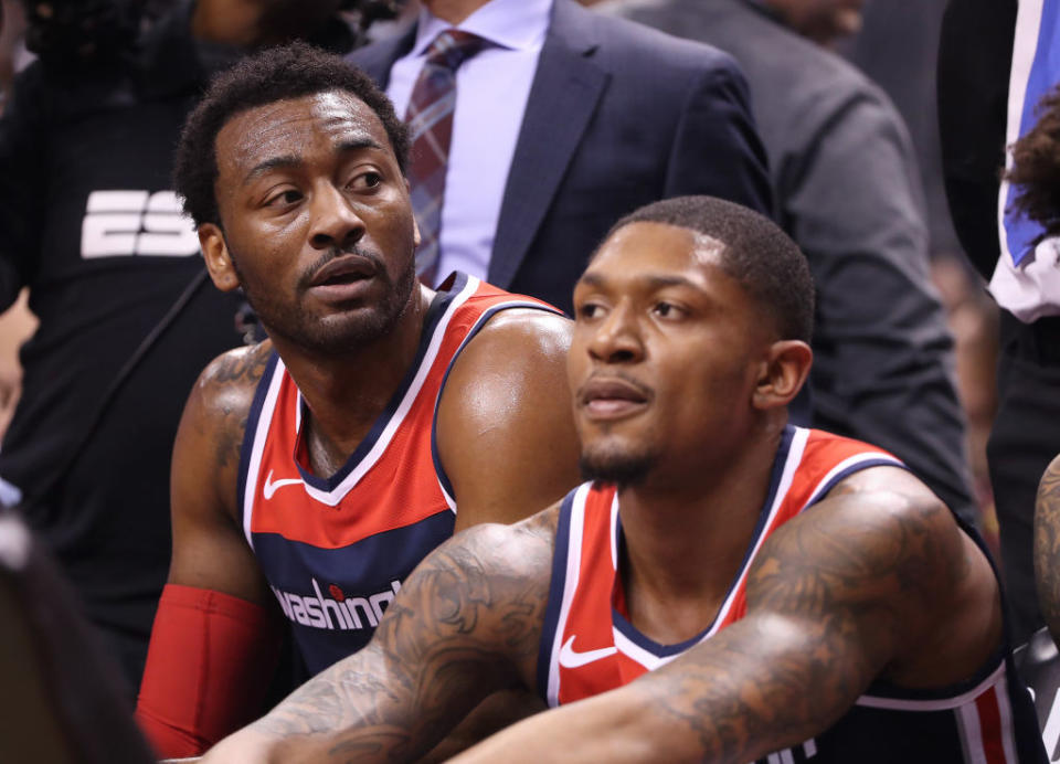 Washington Wizards teammates John Wall and Bradley Beal are looking in different directions. (Getty Images)