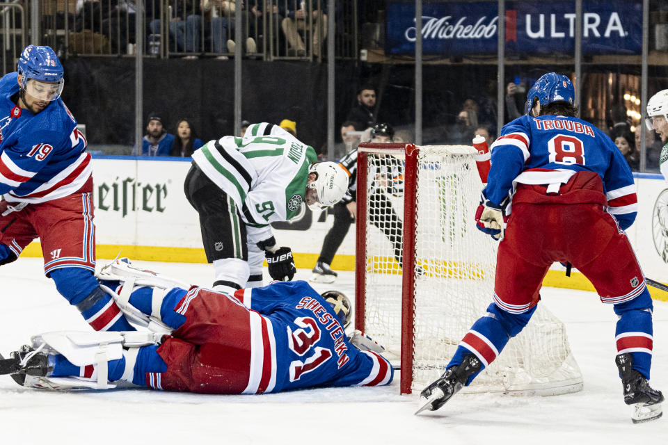 New York Rangers goaltender Igor Shesterkin (31) saves a shot from Dallas Stars center Tyler Seguin (91) during the third period of an NHL hockey game on Tuesday, Feb. 20, 2024 in New York. (AP Photo/Peter K. Afriyie)