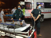 <p>Medical workers transport a person injured in an explosion outside a kindergarten into a hospital in Fengxian County in eastern China’s Jiangsu Province early Friday, June 16, 2017. (Photo: Li Xiang/Xinhua via AP) </p>