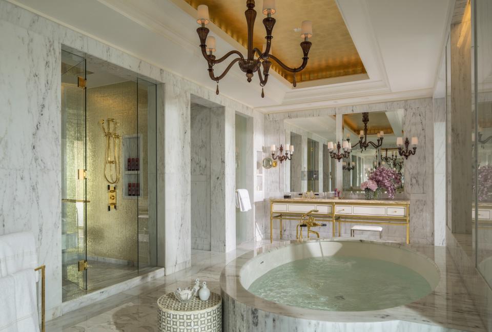 Bathrooms feature deep tubs and his ‘n' hers sinksFour Seasons