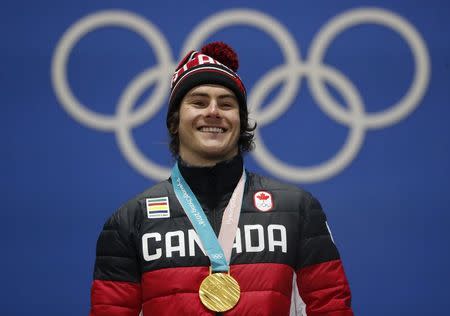 Medals Ceremony - Snowboarding - Pyeongchang 2018 Winter Olympics - Men's Big Air - Medals Plaza - Pyeongchang, South Korea - February 24, 2018 - Gold medalist Sebastien Toutant of Canada on the podium. REUTERS/Jorge Silva