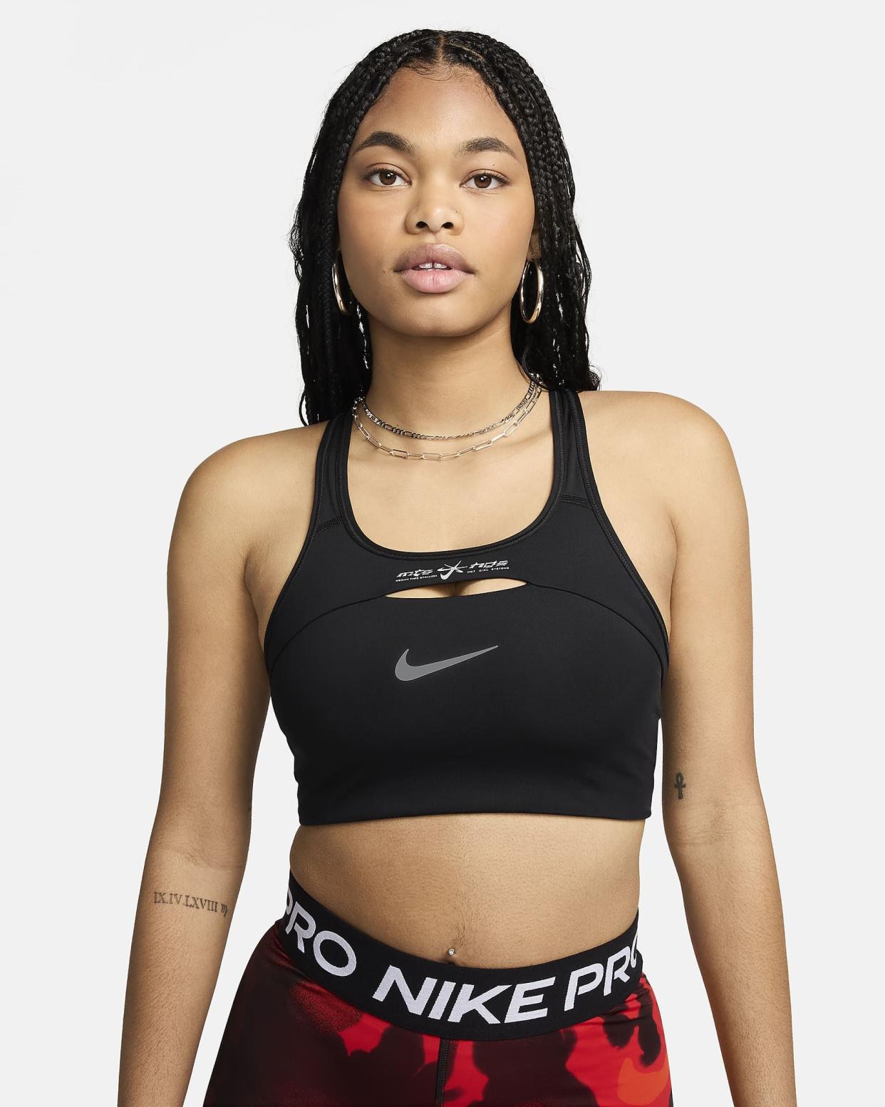 <p><a href="https://go.redirectingat.com?id=74968X1596630&url=https%3A%2F%2Fwww.nike.com%2Ft%2Fmegan-thee-stallion-womens-medium-support-non-padded-sports-bra-j5nbWX%2FFZ0462-010&sref=https%3A%2F%2Fwww.womenshealthmag.com%2Ffitness%2Fg46868284%2Fmegan-thee-stallion-nike-activewear-line%2F" rel="nofollow noopener" target="_blank" data-ylk="slk:Shop Now;elm:context_link;itc:0;sec:content-canvas" class="link rapid-noclick-resp">Shop Now</a></p><p>Nike x Megan Thee Stallion Women's Medium-Support Non-Padded Sports Bra</p><p>$50.00</p>