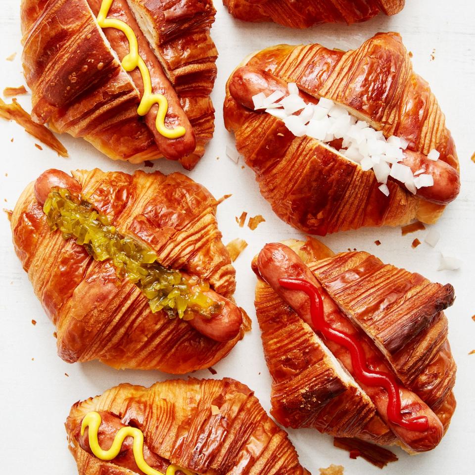 hot dogs in croissants with toppings