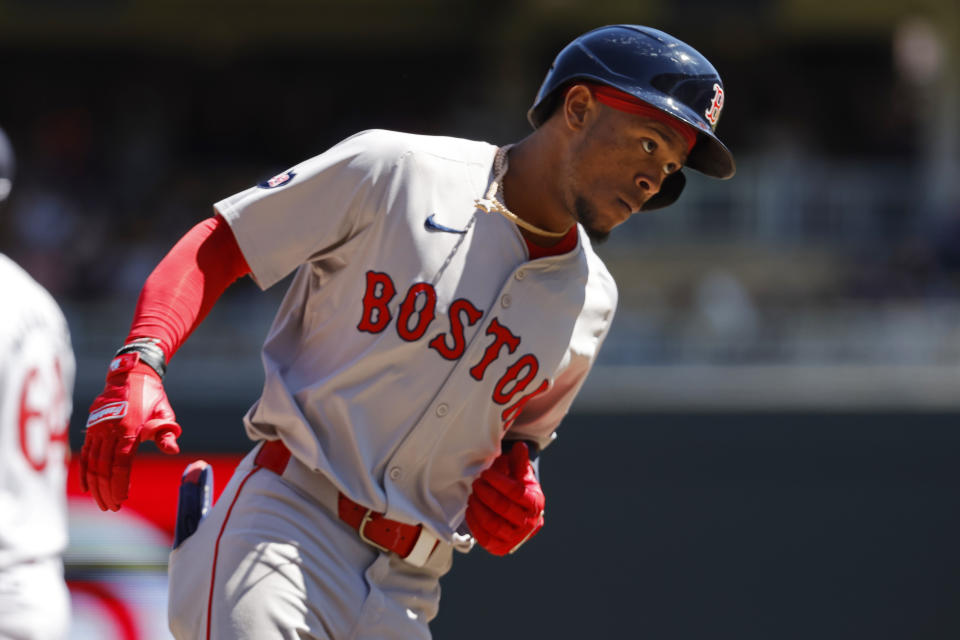 Boston Red Sox's Ceddanne Rafaela runs the bases on a two-run home run against the Minnesota Twins in the fifth inning of a baseball game Sunday, May 5, 2024, in Minneapolis. (AP Photo/Bruce Kluckhohn)