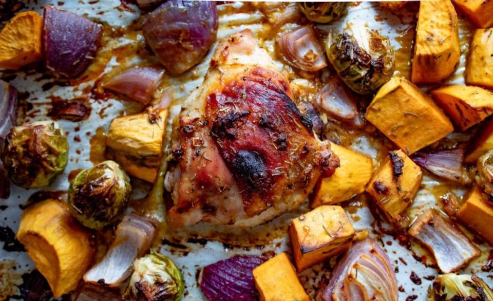 <p>Chenée Today</p><p>This super easy sheet pan dinner is full of flavor and perfect for a weeknight meal!</p><p><strong>Get the recipe: <a href="https://cheneetoday.com/paleo-chicken-thigh-recipe-with-roasted-vegetables/" rel="nofollow noopener" target="_blank" data-ylk="slk:Sheet Pan Chicken Thigh Dinner with Sweet Potatoes;elm:context_link;itc:0;sec:content-canvas" class="link ">Sheet Pan Chicken Thigh Dinner with Sweet Potatoes</a></strong></p>