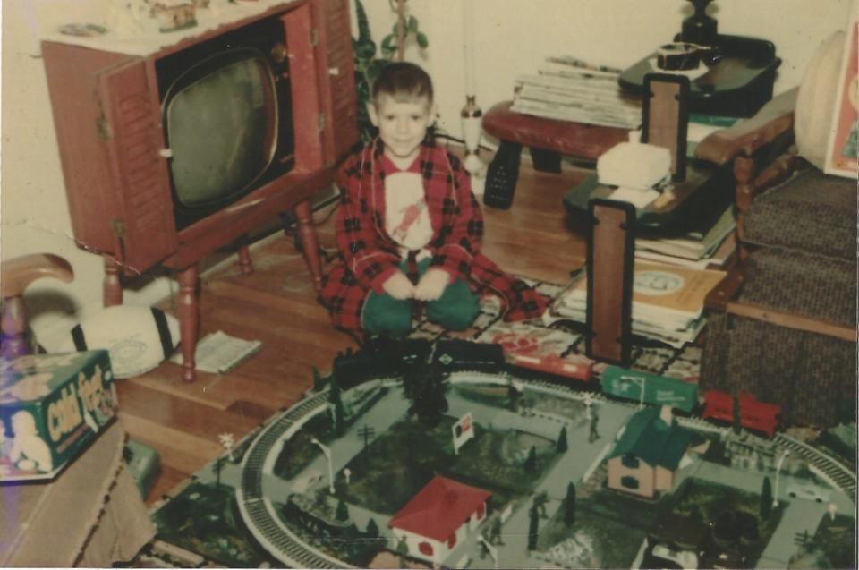 Scott Easterling with his A.C. Gilbert American Flyer All Aboard Train Set  on Christmas Day, 1966.