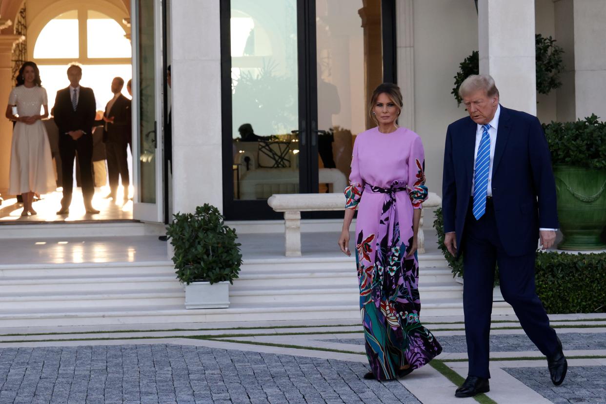 Republican presidential candidate, former US President Donald Trump and former first lady Melania Trump arrive at the home of billionaire investor John Paulson on April 6, 2024 in Palm Beach, Florida.