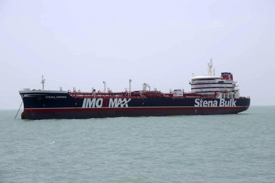 FILE - In this July 20, 2019, file photo, a British-flagged oil tanker Stena Impero which was seized by the Iran's Revolutionary Guard on Friday is photographed in the Iranian port of Bandar Abbas. A ship-tracking website shows a British-flagged oil tanker held by Iran since July moving for the first time in weeks. The movement of the Stena Impero on Tuesday, Sept. 24, comes after a government spokesman in Iran on Monday said legal proceedings against the vessel had concluded.(Tasnim News Agency via AP, File)