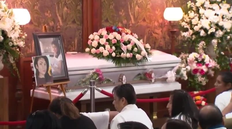 Marlen Ochoa-Lopez's casket inside the Chicago funeral home ahead of Saturday's service. A photo of her on her wedding was next to the casket.