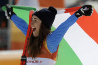 <p>Italy’s Sofia Goggia celebrates after winning gold in the women’s downhill at the 2018 Winter Olympics in Jeongseon, South Korea, Wednesday, Feb. 21, 2018. (AP Photo/Michael Probst) </p>