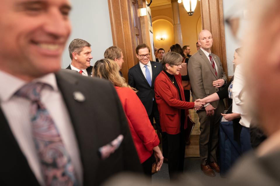 Gov. Laura Kelly enters a news conference with Lt. Gov. David Toland while Senate President Ty Masterson, R-Andover, speaks with reporters on Thursday. The state announced a Integra Technologies expansion to build a semiconductor manufacturing facility in Wichita using state and federal incentive programs.