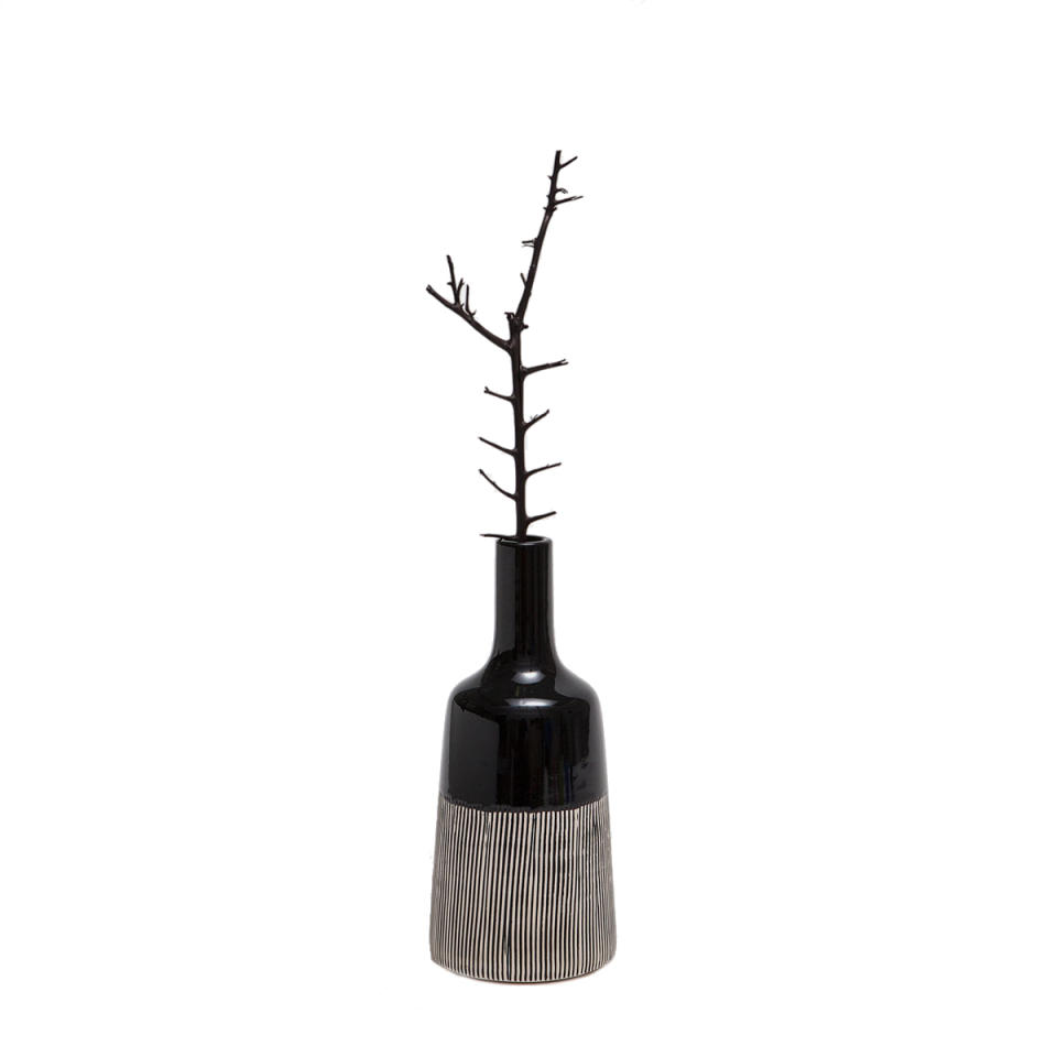 <p><a rel="nofollow noopener" href="https://www.zarahome.com/us/decoration/vases/black-striped-vase-c1020031277p300031714.html" target="_blank" data-ylk="slk:Black Striped Vase;elm:context_link;itc:0;sec:content-canvas" class="link ">Black Striped Vase</a>, $30</p>