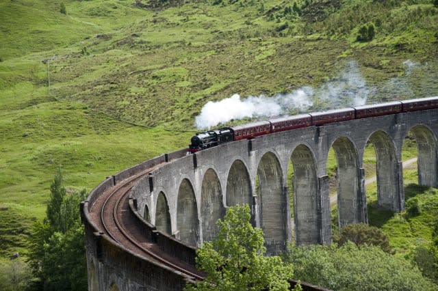 Jacobite steam train on Glenfinnan Viaduct from Fort William to Mallaig.