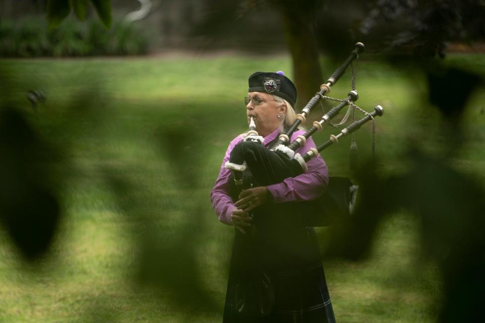 A bagpiper plays "Amazing Grace" during a 9/11 memorial service in Knoxville, Tenn. on Sunday, Sept. 11, 2022.