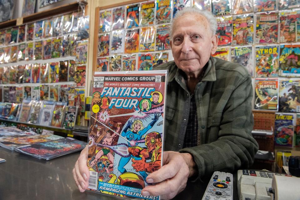 Al Greco, owner of Al's Comics, holds an issue of the Fantastic Four comic book at his shop on the Miracle Mile in Stockton on Friday, Mar. 17, 2023. In 1986, Greco was part of the effort to get Marvel to name Stockton as the birthplace of the Fantastic Four.