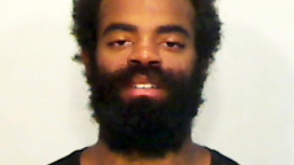 Andrew Toles, pictured here after he was arrested for trespassing.