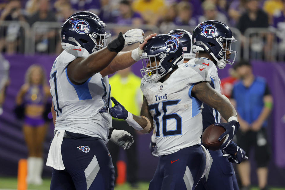 Tennessee Titans running back Julius Chestnut (36) celebrates with teamamtes after running the ball for a touchdown in the second half of a preseason NFL football game against the Minnesota Vikings, Saturday, Aug. 19, 2023, in Minneapolis. (AP Photo/Bruce Kluckhohn)