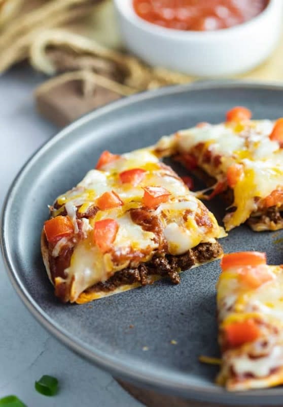 <p>The Cozy Cook</p><p>Make Taco Bell's Mexican Pizza recipe right at home! </p><p><strong>Get the recipe: </strong><a href="https://thecozycook.com/copycat-taco-bell-mexican-pizza/" rel="nofollow noopener" target="_blank" data-ylk="slk:Copycat Taco Bell Mexican Pizza;elm:context_link;itc:0;sec:content-canvas" class="link "><strong>Copycat Taco Bell Mexican Pizza</strong></a></p>