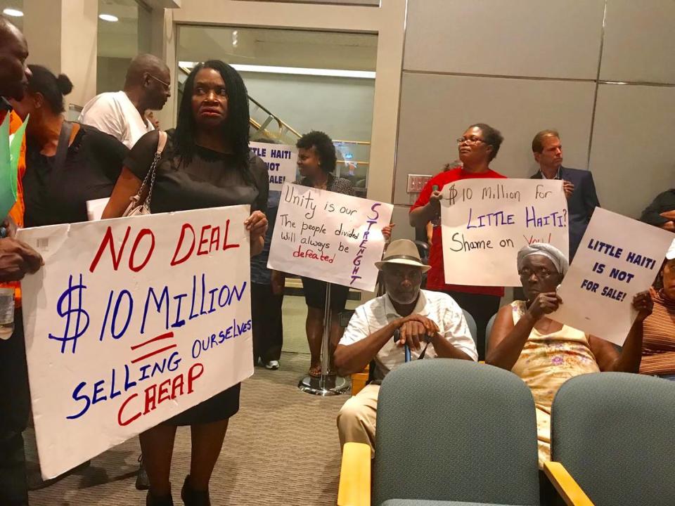 Little Haiti activist Marleine Bastien, left, led a group of residents opposed to a proposed 22-acre redevelopment called Eastside Ridge during a 2018 hearing at Miami City Hall. The massive complex of residential and commercial towers would replace the D Place apartments on the corner of Northeast Second Avenue and Northeast 50th Street.