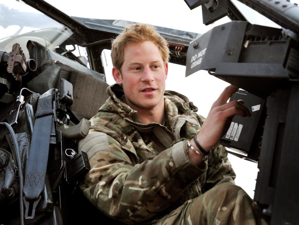 Prince Harry in an apache helicopter  ( )