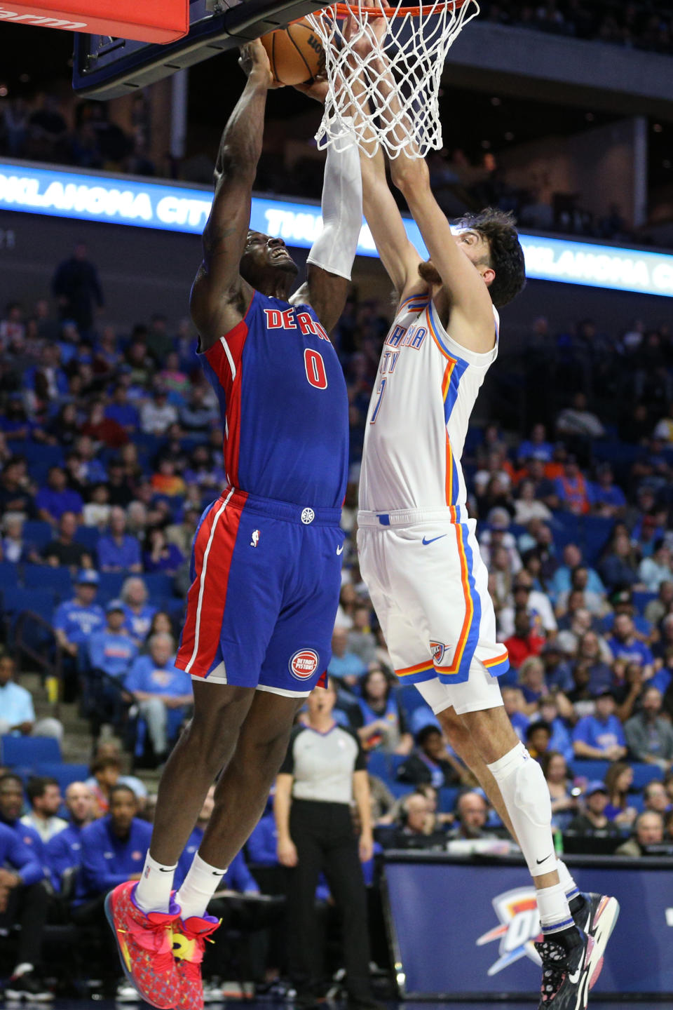 Oct 19, 2023; Tulsa, Oklahoma, USA; Oklahoma City Thunder forward Chet Holmgren (7) blocks the shot of Detroit Pistons center Jalen Duren (0) in the first half at BOK Center. Mandatory Credit: Joey Johnson-USA TODAY Sports