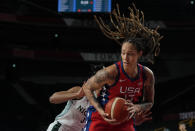 United States' Brittney Griner (15) grabs a rebound during women's basketball preliminary round game against Nigeria at the 2020 Summer Olympics, Tuesday, July 27, 2021, in Saitama, Japan. (AP Photo/Eric Gay)