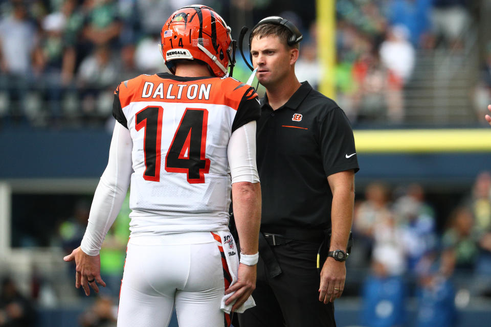 SEATTLE, WASHINGTON - SEPTEMBER 08: Andy Dalton #14 and head coach Zac Taylor of the Cincinnati Bengals have a conversation in the fourth quarter against the Seattle Seahawks during their game at CenturyLink Field on September 08, 2019 in Seattle, Washington. (Photo by Abbie Parr/Getty Images)