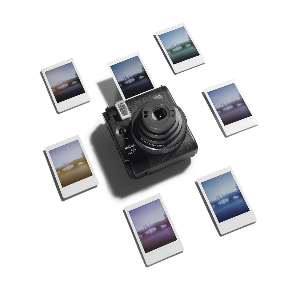 This photo shows the Instax Mini 99 instant camera from Fujifilm. Gift one to the dad who loves to have fun with instant film effects. (Fujifilm via AP)