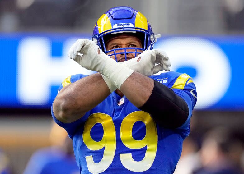 Los Angeles Rams defensive tackle Aaron Donald warms up before an NFL football game against the Arizona Cardinals Sunday, Nov. 13, 2022, in Inglewood, Calif. (AP Photo/Mark J. Terrill)