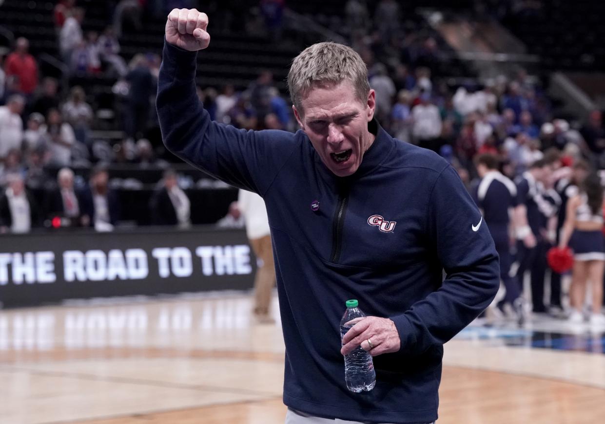 Gonzaga Bulldogs head coach Mark Few celebrates after defeating the Kansas Jayhawks in the second round of the 2024 NCAA Tournament at Vivint Smart Home Arena-Delta Center.