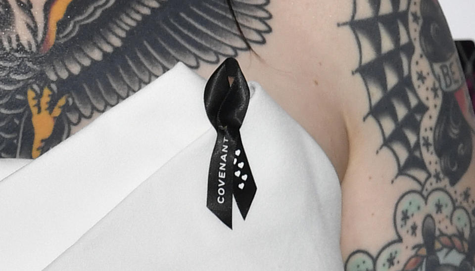 Ashley McBryde arrives wearing a black ribbon in honor of the victims of the shooting at Covenant school in Nashville, Tenn. at the CMT Music Awards on Sunday, April 2, 2023, at the Moody Center in Austin, Texas. (Photo by Evan Agostini/Invision/AP)