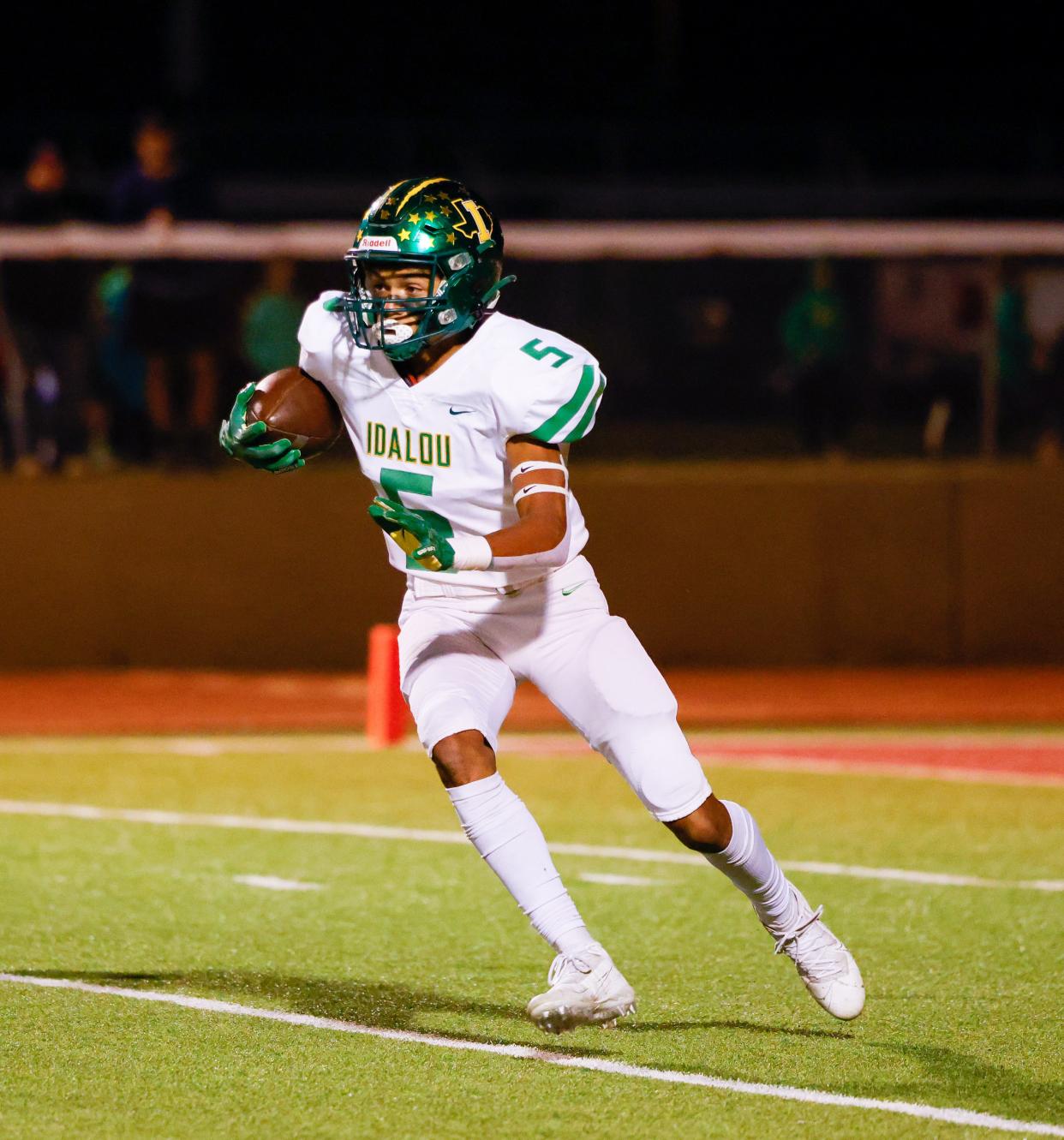 Idalou’s Malachi Brisco (5) runs the ball against the Abernathy defense during a District 4-3A, Division II game Friday, Oct. 15, 2021 at Antelope Field in Abernathy, Texas.