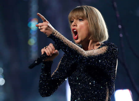 FILE PHOTO: Taylor Swift performs "Out of the Woods" at the 58th Grammy Awards in Los Angeles, California, U.S. on February 15, 2016. REUTERS/Mario Anzuoni/File Photo