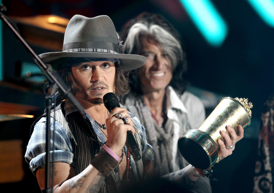 Johnny Depp accepts the the MTV Generation Award at the MTV Movie Awards on Sunday, June 3, 2012 in Los Angeles. (Photo by Matt Sayles/Invision/AP)