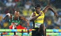 2016 Rio Olympics - Athletics - Preliminary - Men's 110m Hurdles Round 1 - Olympic Stadium - Rio de Janeiro, Brazil - 15/08/2016. Omar McLeod (JAM) of Jamaica competes. REUTERS/Lucy Nicholson