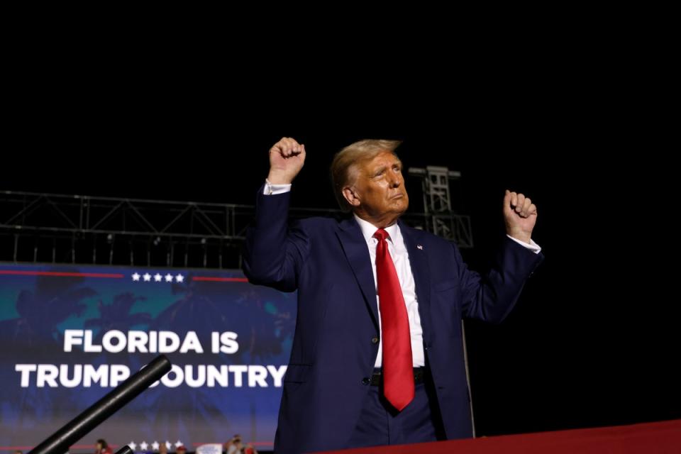 Donald Trump holds a campaign rally in Florida on 8 November (Getty Images)